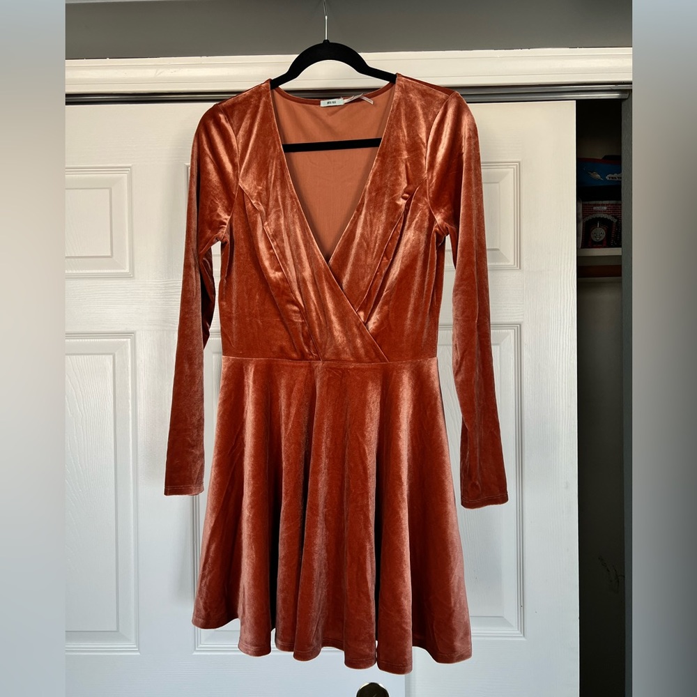 Salmon colored velvet skater style dress.
